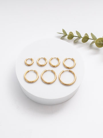 Thick Hoop Earrings in Gold